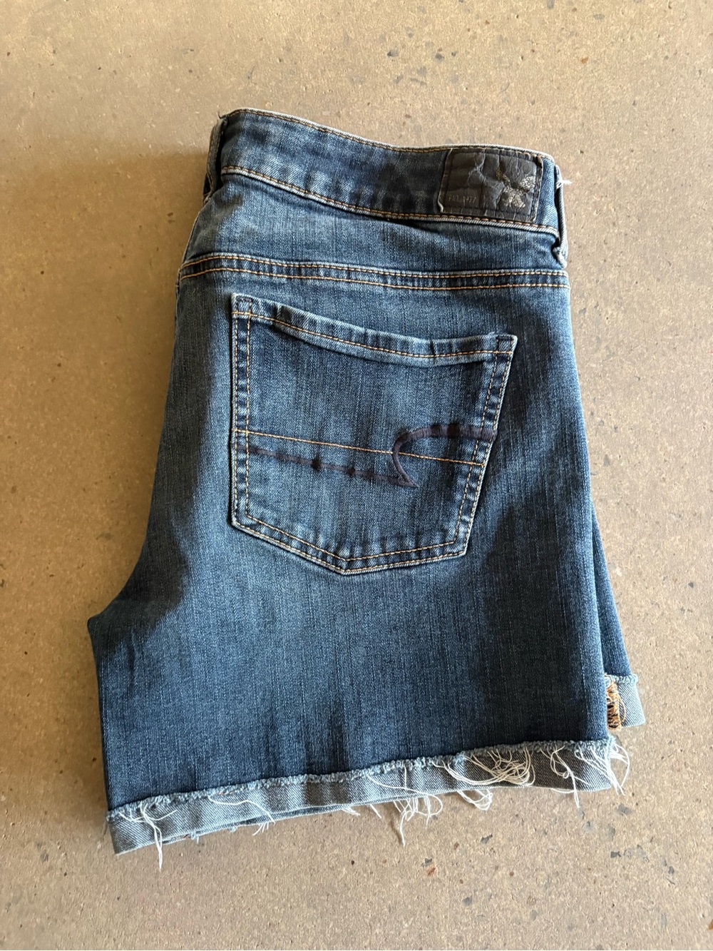 American Eagle distressed frayed midi Jean shorts size 10
